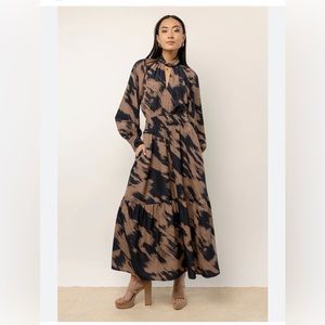 Brand new with tags never worn. Great looking day dress for the Fall season